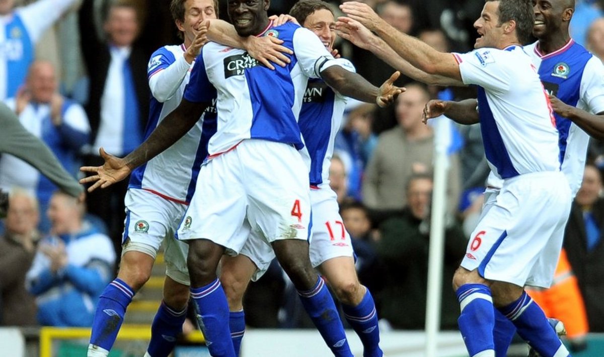 Blackburn Rovers' Congolese defender Christopher Samba (2L) celebrates after scoring his sides second goal during the English Premier league football match against Arsenal at Ewood Park, in Blackburn, north-west, England, on May 3, 2010. AFP PHOTO/ANDREW YATES  FOR EDITORIAL USE ONLY Additional licence required for any commercial/promotional use or use on TV or internet (except identical online version of newspaper) of Premier League/Football League photos. Tel DataCo +44 207 2981656. Do not alter/modify photo.