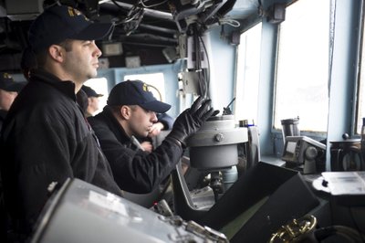 Crew from US navy aboard at USS Viksburg participating in NATO's Dynamic Mongoose anti-submarine exercise in the North Sea off the coast of Norway
