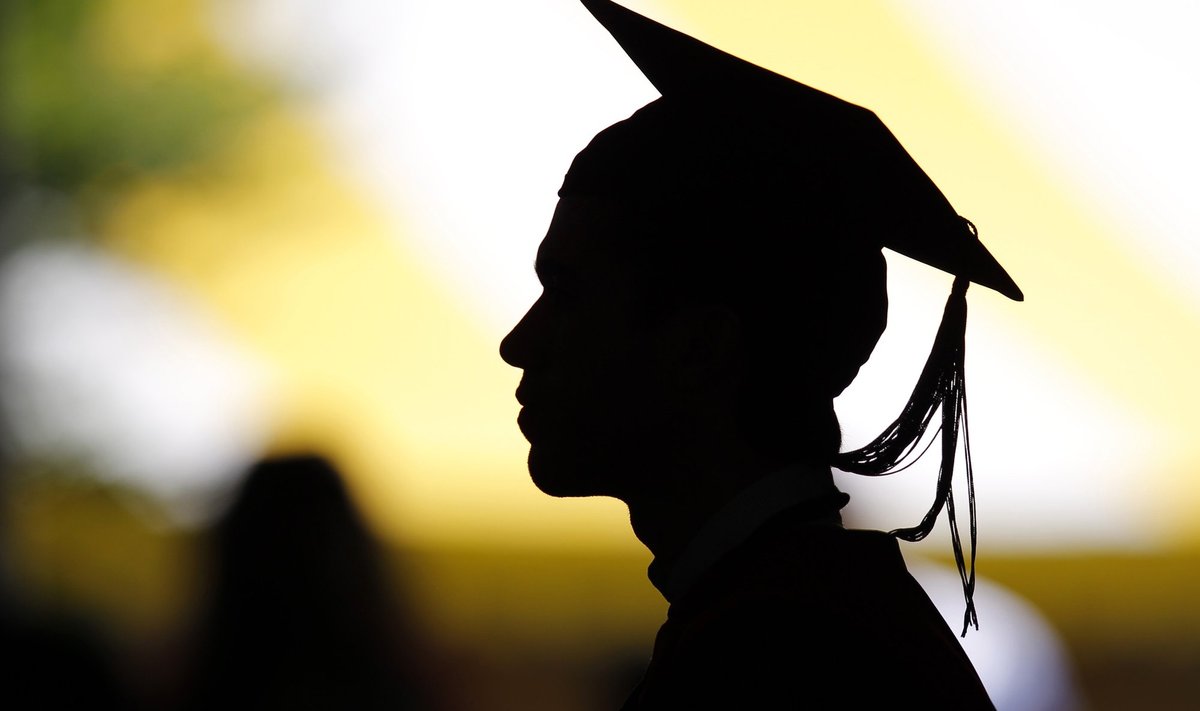 File picture shows the silhouette of a student with a graduation cap during a diploma ceremony at the John F. Kennedy School of Government