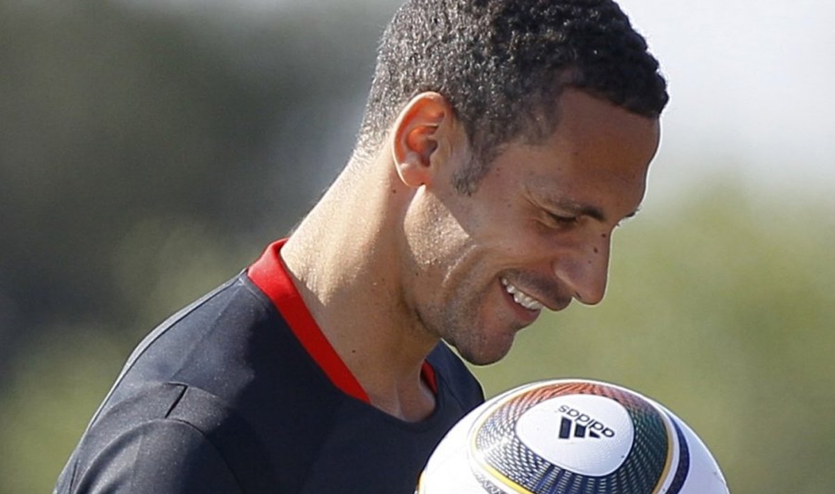 England soccer player Rio Ferdinand during a training session at Royal Bafokeng Sports Complex where the England soccer team are based, near Rustenburg, South Africa, Friday June 4, 2010. Ferdinand has gone to hospital for a scan on his left knee following a tackle in the training session. (AP Photo/Kirsty Wigglesworth) / SCANPIX Code: 436