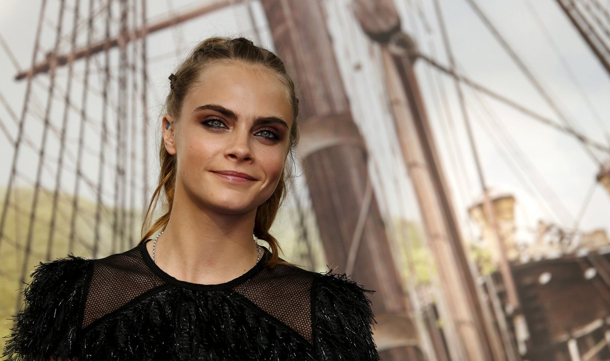 Model and actress Cara Delevigne arrives for the world premiere of "Pan" at Leicester Square in London, Britain