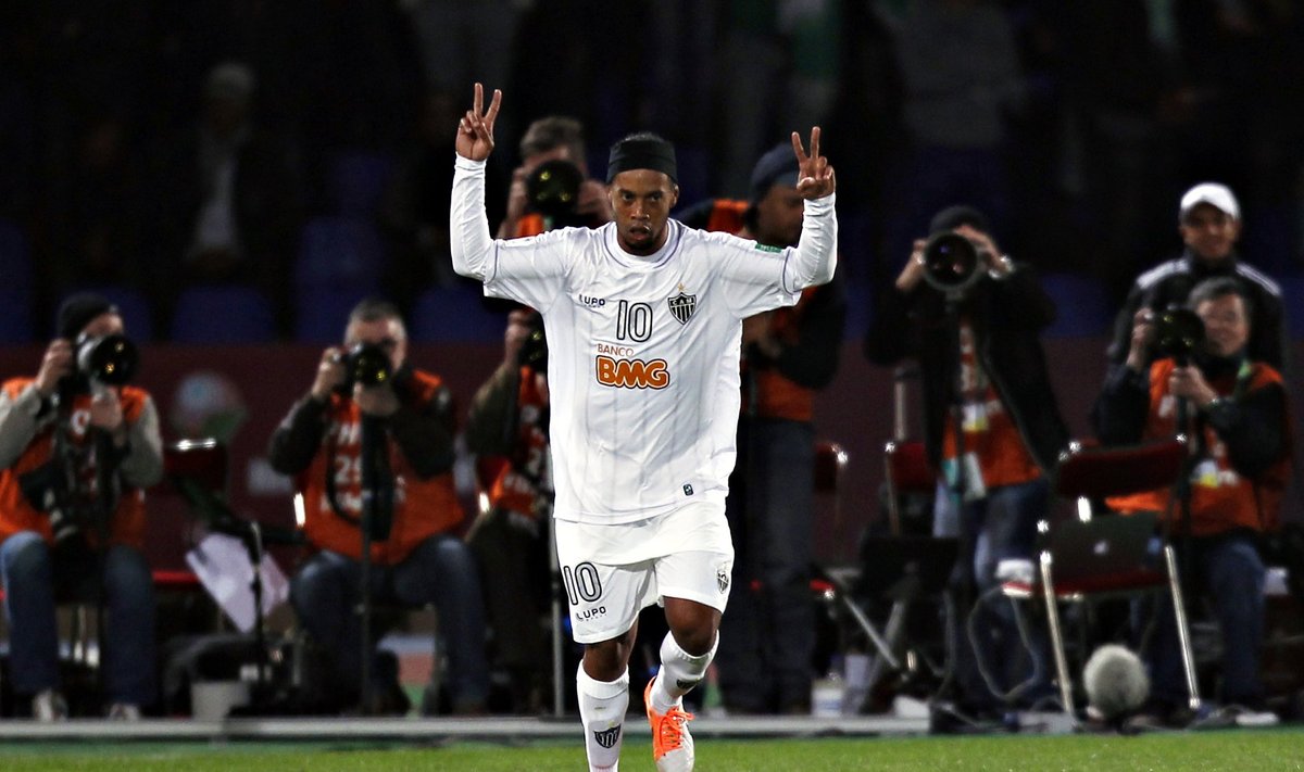 Atletico Mineiro's Ronaldinho celebrates and dances after his goal against Raja Casablanca during their FIFA Club World Cup semi-final match at Marrakech stadium