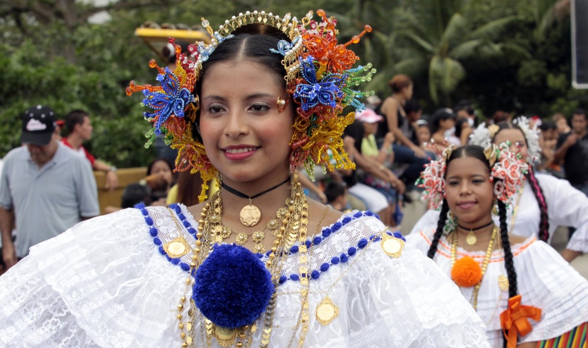 A young woman dressed in a traditional outfit takes part in celebrating the anniversary of the first call of independence in Panama City