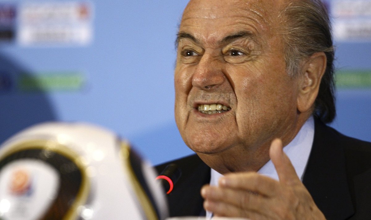 FIFA President Sepp Blatter speaks to the media during a news conference, ahead of the FIFA Club World Cup final soccer match on Saturday, in Abu Dhabi December 17, 2009.   REUTERS/Fahad Shadeed (UNITED ARAB EMIRATES - Tags: SPORT SOCCER HEADSHOT)