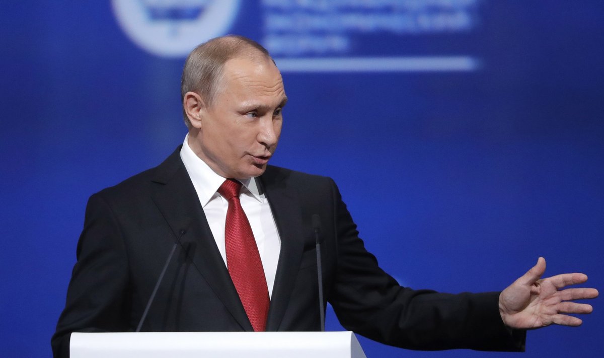 Russian President Putin speaks during a session of the St. Petersburg International Economic Forum