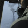 FOTOD: USA piirivalve üritab Jaapani "kummituslaeva" põhja lasta