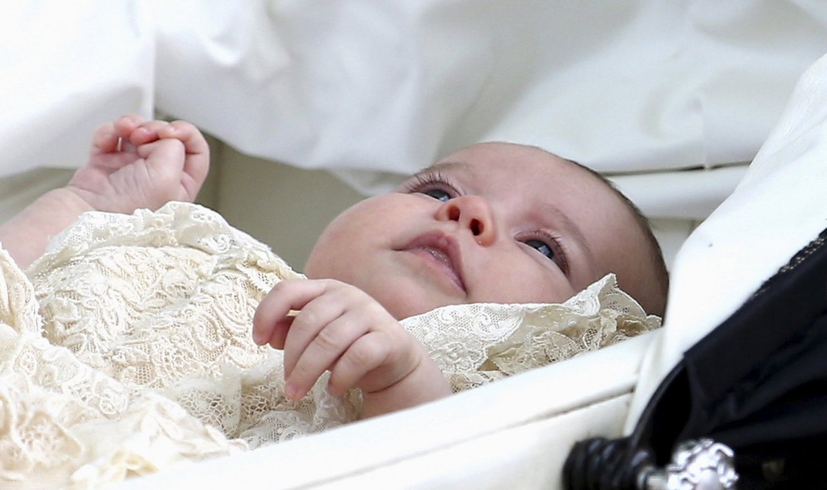 Princess Charlotte is seen inside a pram as she leaves the Church of St Mary Magdalene