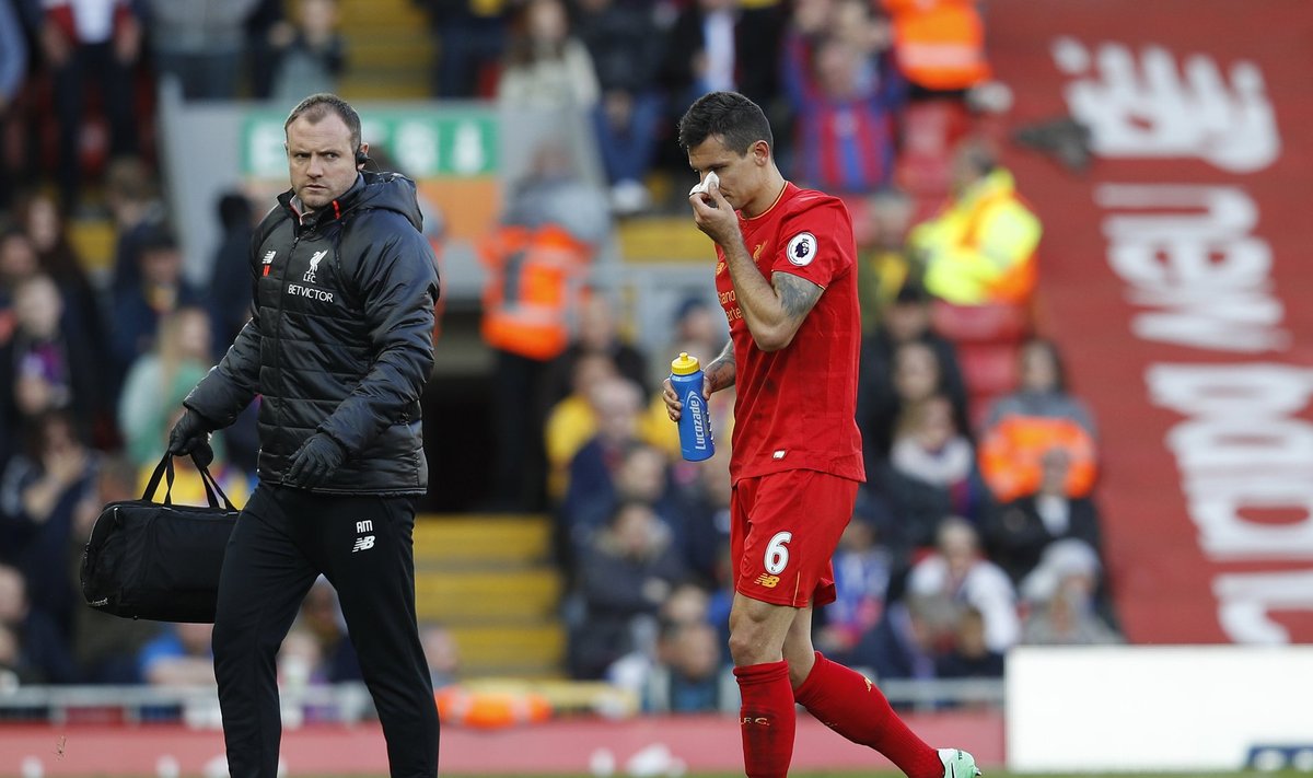 Liverpool's Dejan Lovren goes off injured