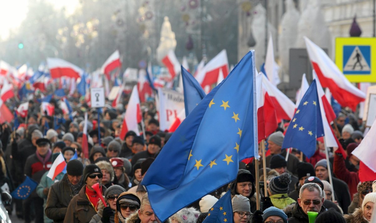 People demonstrate during anti-government rally in Warsaw