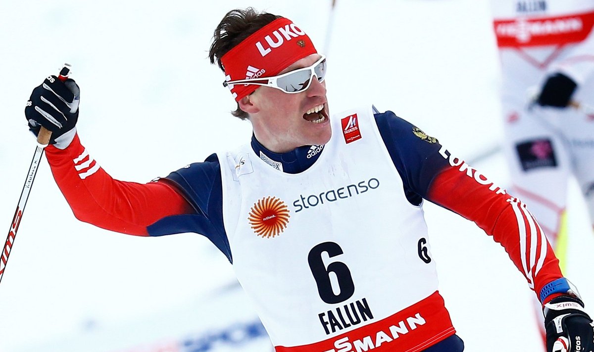 Vylegzhanin of Russia celebrates winning the men's cross-country 15 km classic and 15 km freestyle skiathlon event at at the Nordic World Ski Championships in Falun
