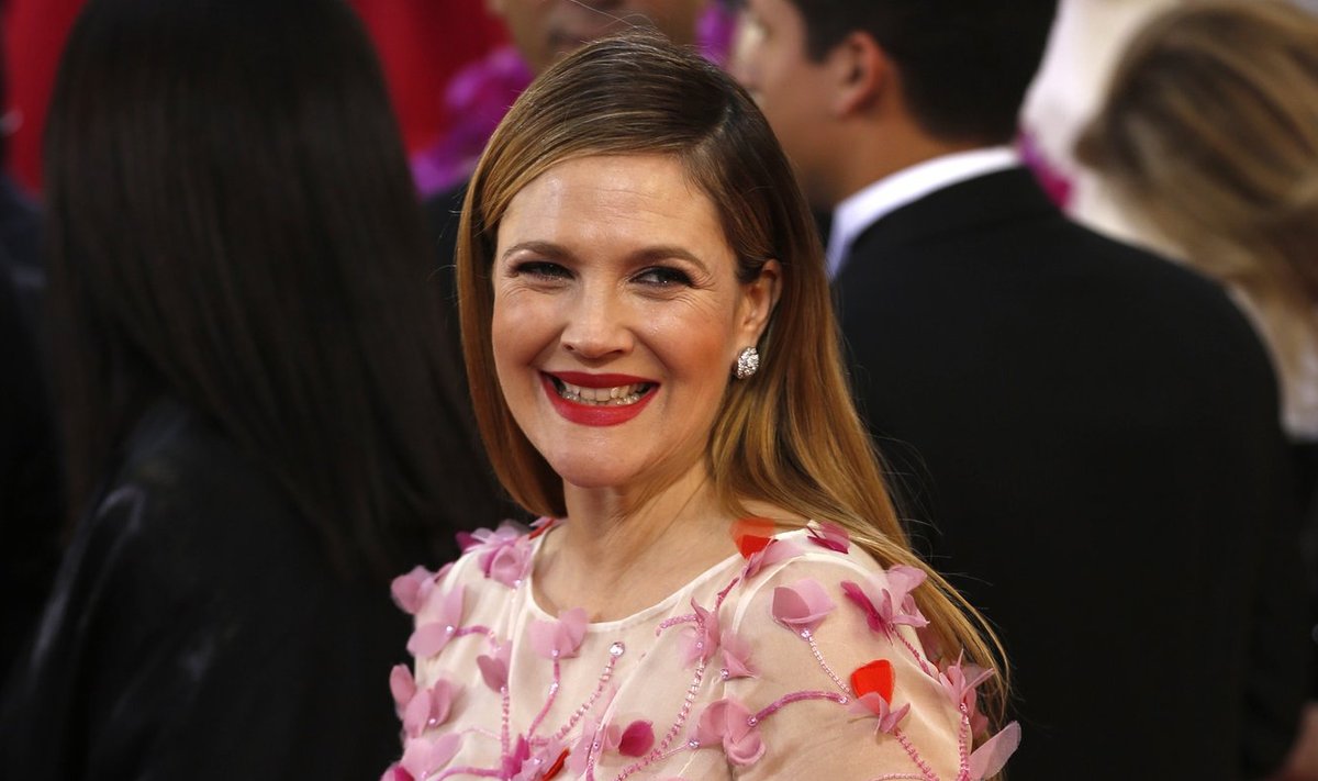 Actress Drew Barrymore arrives at the 71st annual Golden Globe Awards in Beverly Hills