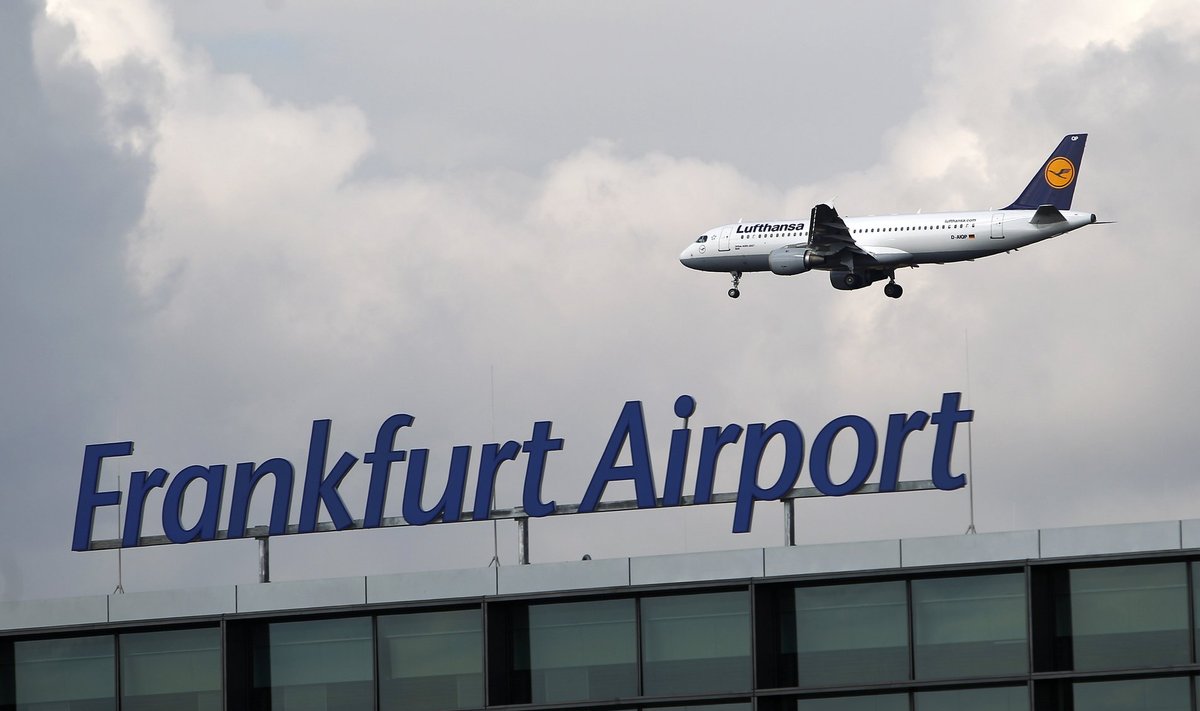 File photo of an aircraft flying beyond newly built A-Plus terminal section at the Fraport airport in Frankfurt