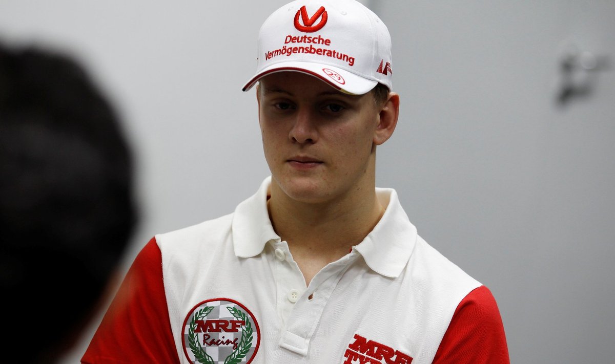 Mick, son of world formula one star Michael Schumacher, arrives at media centre to speak to press after his MRF open tire race at Bahrain International Circuit, in Sakhir south of Manama, Bahrain