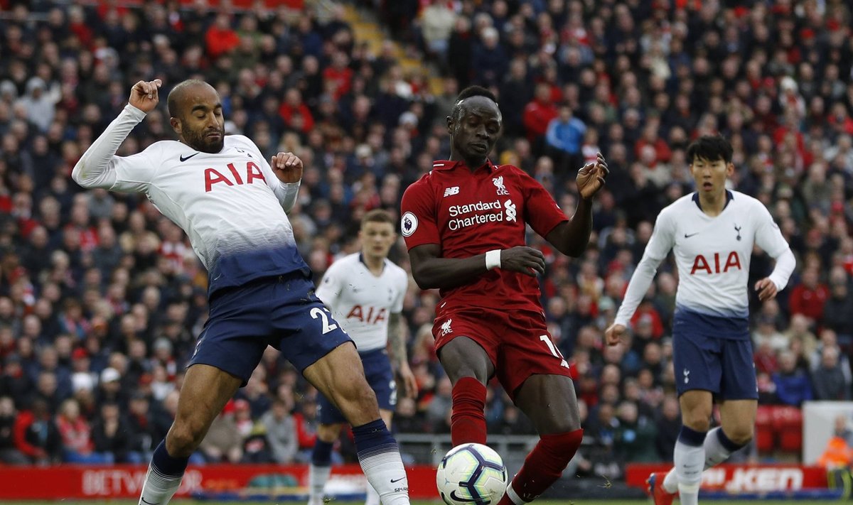 Sadio Mane of Liverpool is tackled by Lucas Moura of Tottenham during the Premier League match at A