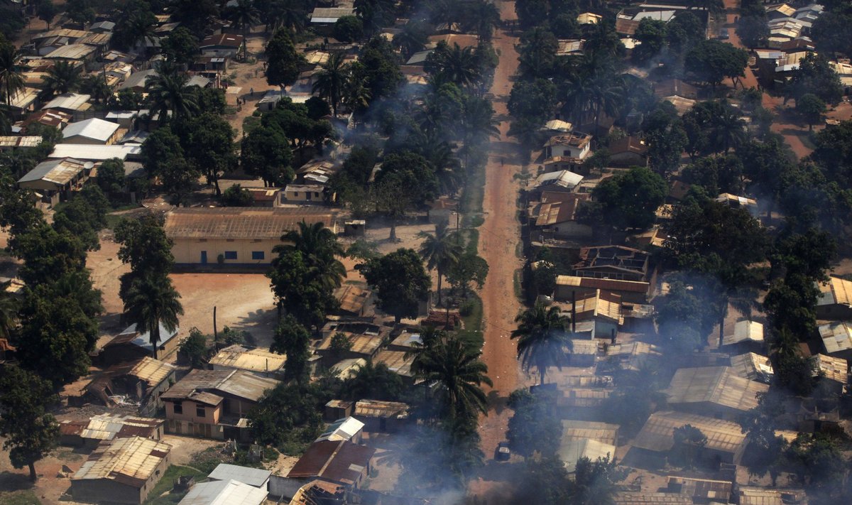 Smoke rises after homes were damaged in arson attacks in this aerial view of a neighbourhood in Bangui
