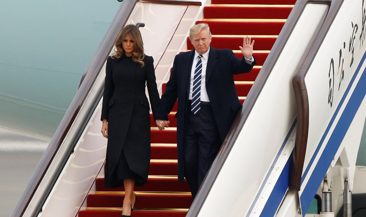 U.S. President Donald Trump and first lady Melania arrive on Air Force One at Beijing