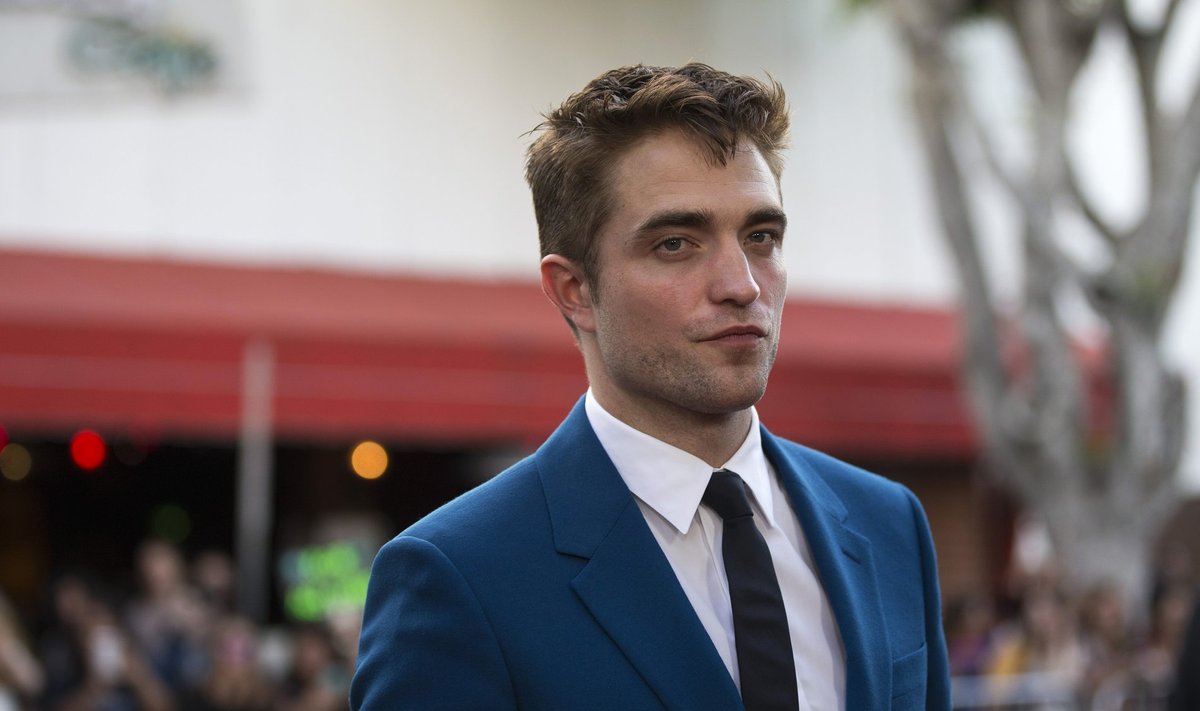 Cast member Pattinson poses at the premiere of "The Rover" in Los Angeles