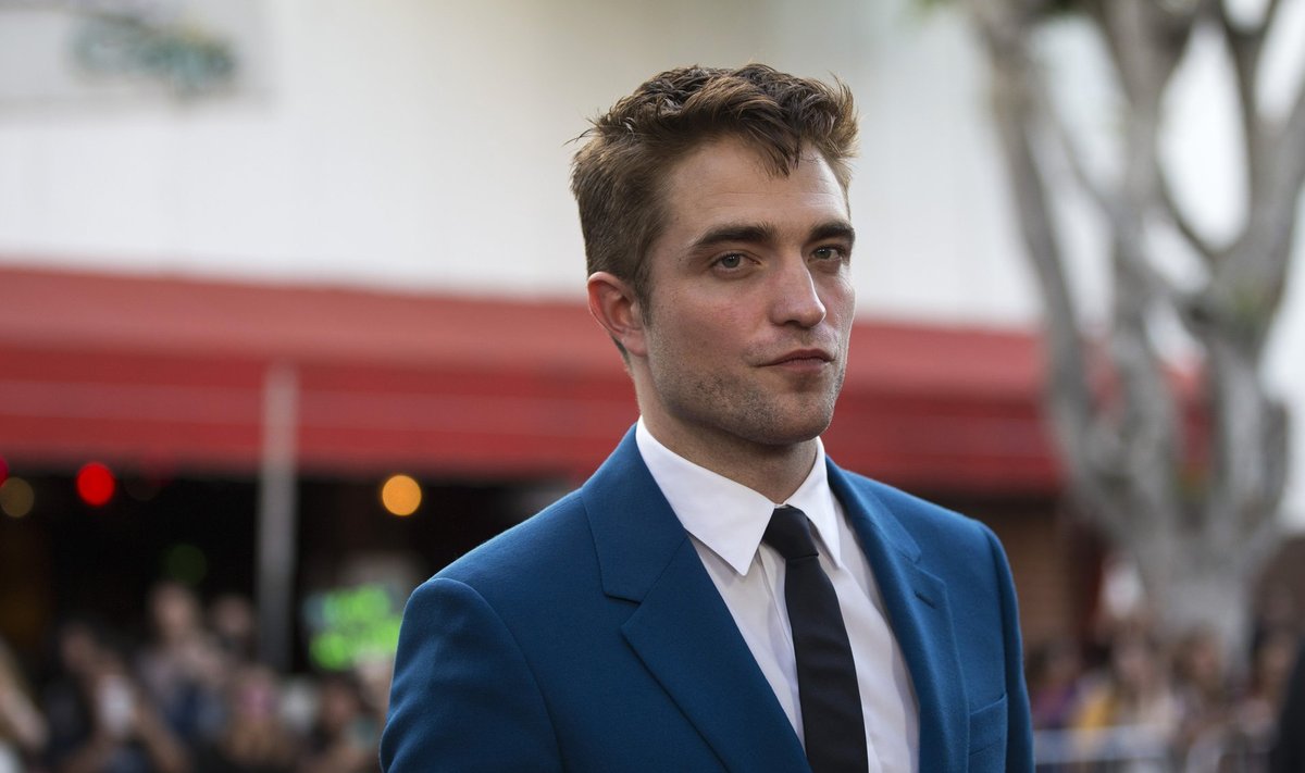 Cast member Pattinson poses at the premiere of "The Rover" in Los Angeles