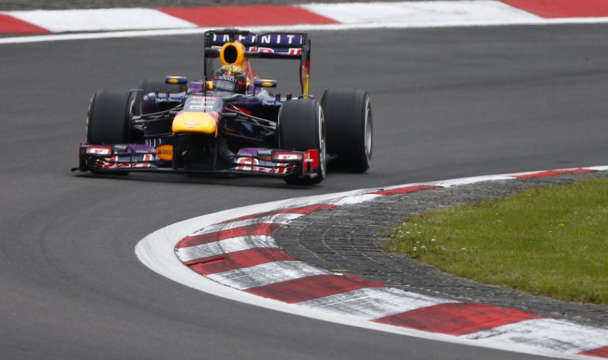 Red Bull Formula One driver Vettel takes corner during second practice session of German F1 Grand Prix at Nuerburgring