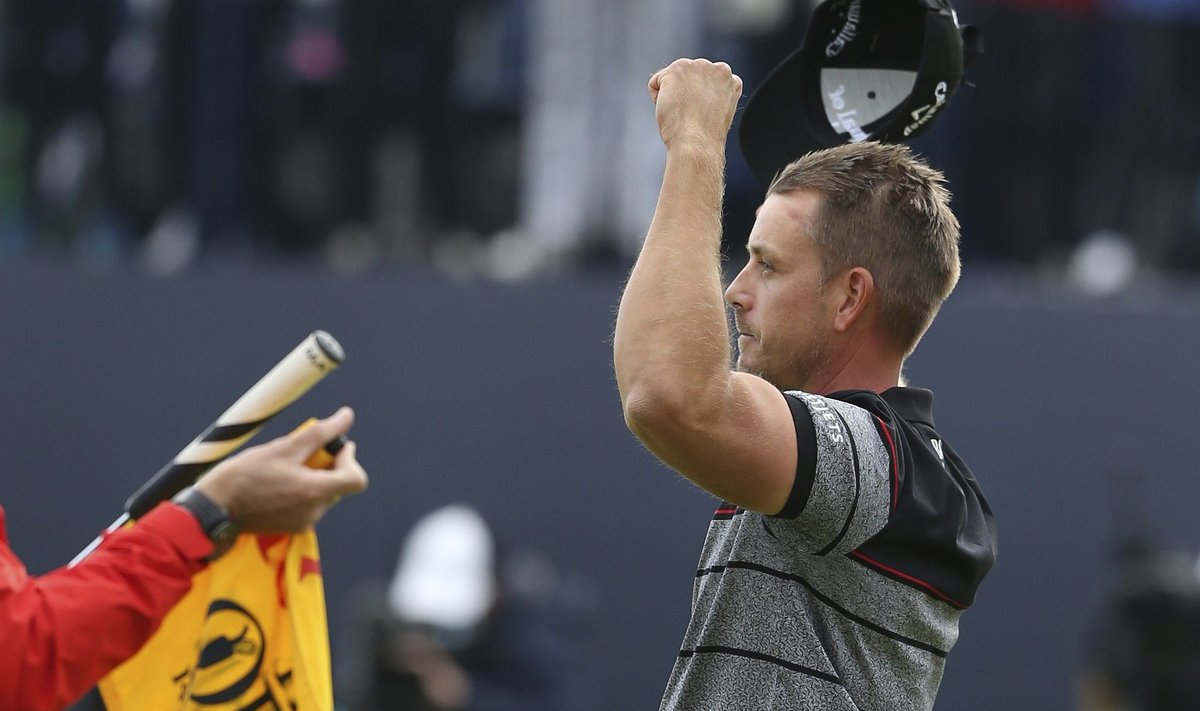 Sweden's Henrik Stenson celebrates after winning the British Open golf championship at Royal Troon, Scotland