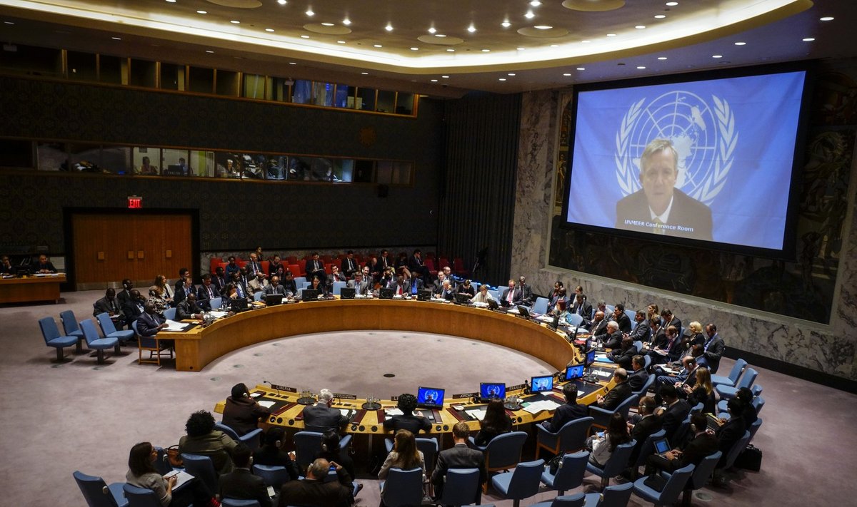 U.N. Ebola mission chief Anthony Banbury (on Screen) speaks to members of the United Nations Security Council during a meeting on the Ebola crisis at the U.N. headquarters in New York