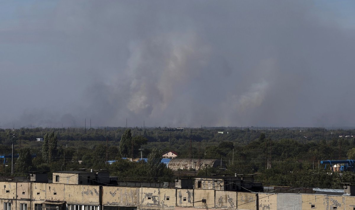 Smoke rises in the sky after shelling on the outskirts of Donetsk, eastern Ukraine