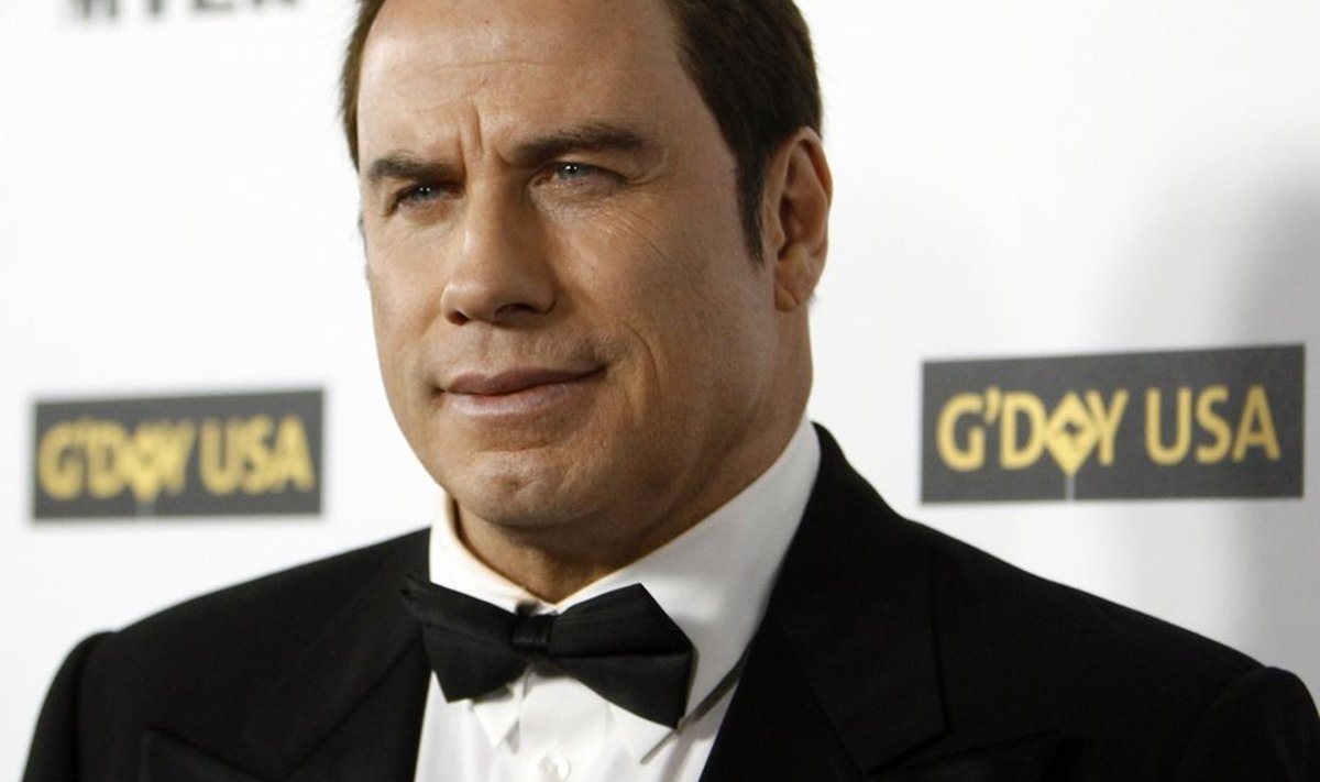 Actor John Travolta poses at the G'Day USA 2010 Los Angeles gala in Hollywood, California January 16, 2010. The evening honors high profile individuals for their achievements and for excellence in promoting Australia in the United States.  REUTERS/Mario Anzuoni   (UNITED STATES - Tags: ENTERTAINMENT)
