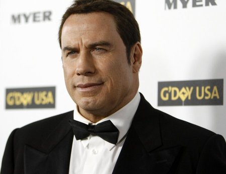 Actor John Travolta poses at the G'Day USA 2010 Los Angeles gala in Hollywood, California January 16, 2010. The evening honors high profile individuals for their achievements and for excellence in promoting Australia in the United States.  REUTERS/Mario Anzuoni   (UNITED STATES - Tags: ENTERTAINMENT)