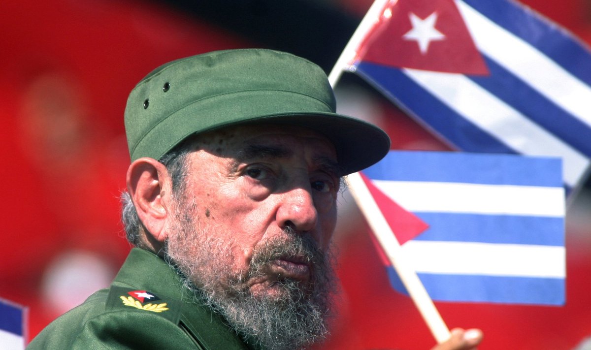 File photo of then Cuban President Fidel Castro glancing over his shoulder during the May Day commemoration at Revolution Square in Havana