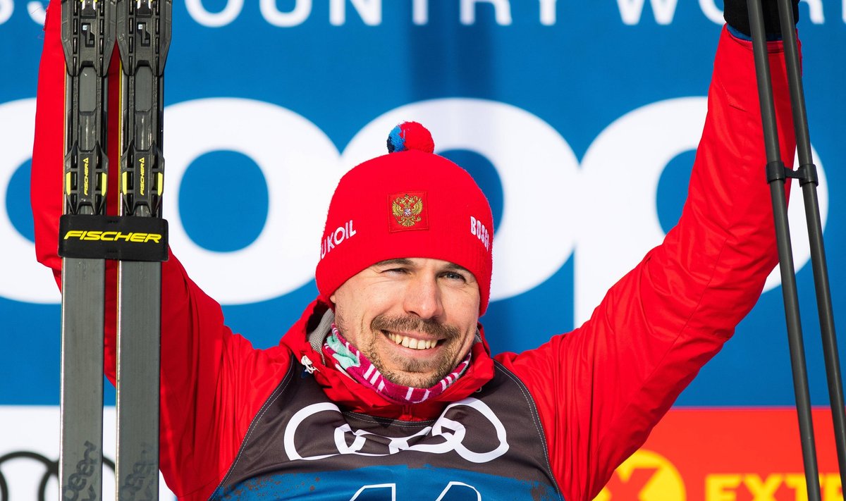 191231 Sergey Ustiugov of Russia celebrate on the podium after the men"!s 15 km free technique interval start during Tou