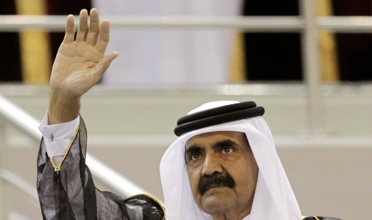 Emir of Qatar Sheikh Hamad bin Khalifa al-Thani waves before the Emir Cup  final match between Al-Sadd and Al-Gharafa at Khalifa stadium in Doha