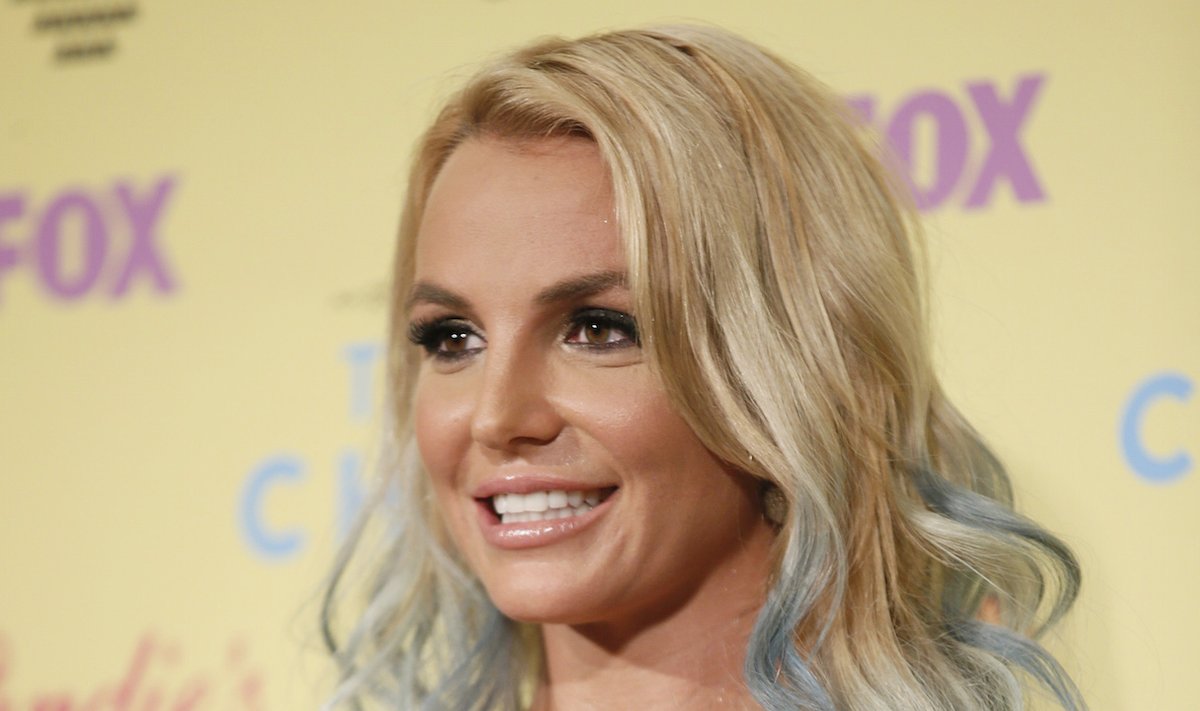 Singer Britney Spears poses backstage at the 2015 Teen Choice Awards in Los Angeles