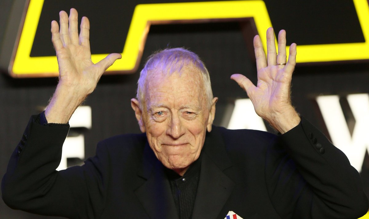 Max von Sydow gestures as he arrives at the European Premiere of Star Wars, The Force Awakens in Leicester Square, London