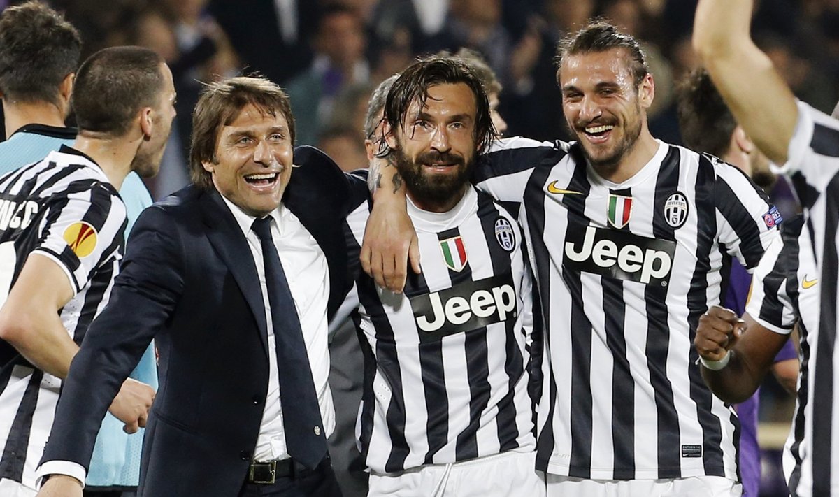 Juventus' coach Conte with players Pirlo and Osvaldo celebrate after defeating Fiorentina in their Europa League round of 16 second leg soccer match in Florence