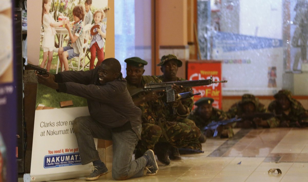 Soldiers and armed police hunt gunmen who went on a shooting spree in Westgate shopping centre in Nairobi