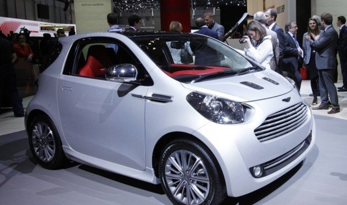 The new Aston Martin Cygnet car is displayed on the exhibition stand of Aston Martin during the first media day of the 80th Geneva Car Show at the Palexpo in Geneva March 2, 2010.     REUTERS/Denis Balibouse (SWITZERLAND - Tags: TRANSPORT BUSINESS IMAGES OF THE DAY)