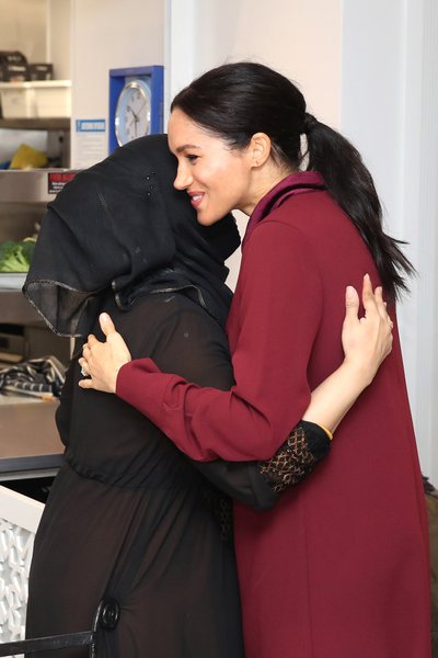Britain's Meghan, Duchess of Sussex visits the Hubb Community Kitchen to see how funds raised by the 'Together: Our Community' cookbook are making a difference at Al Manaar, in London