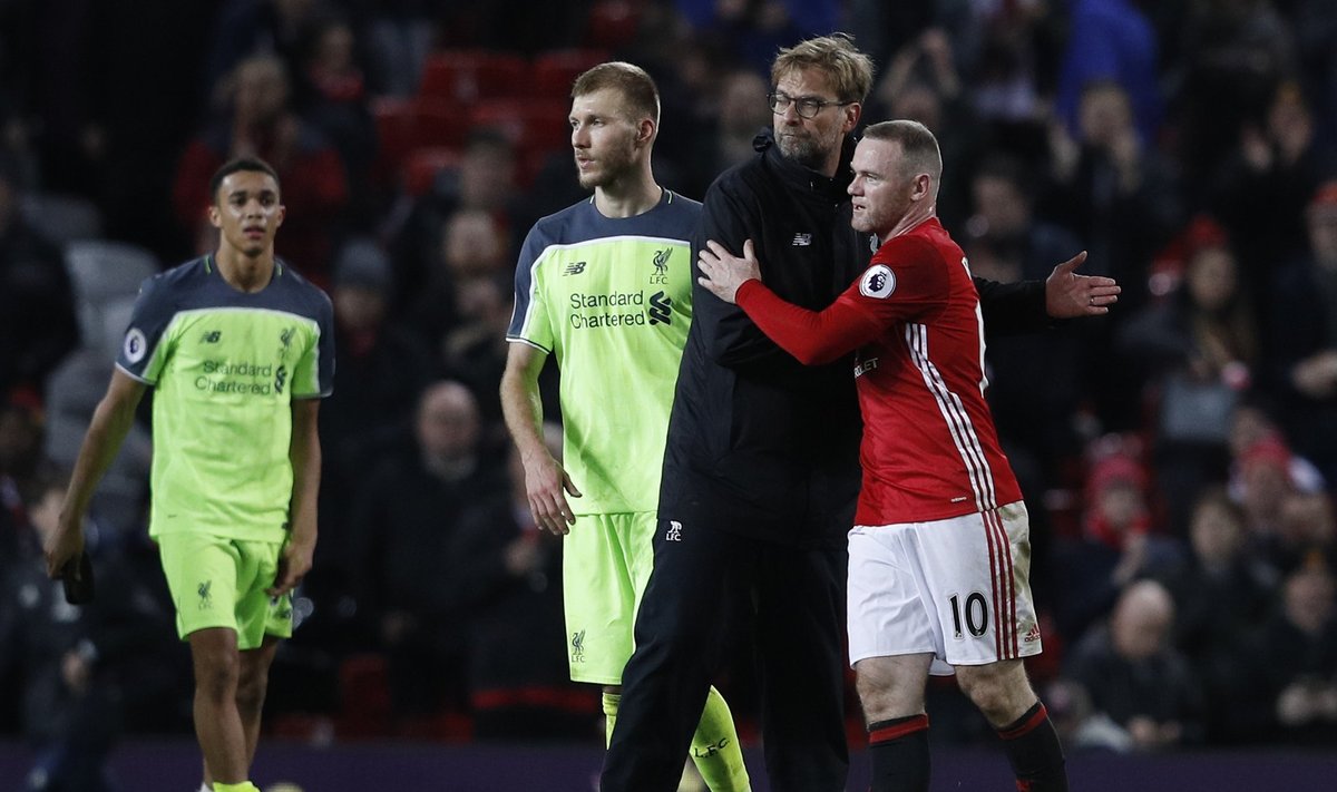 Liverpool manager Juergen Klopp and Manchester United's Wayne Rooney after the game