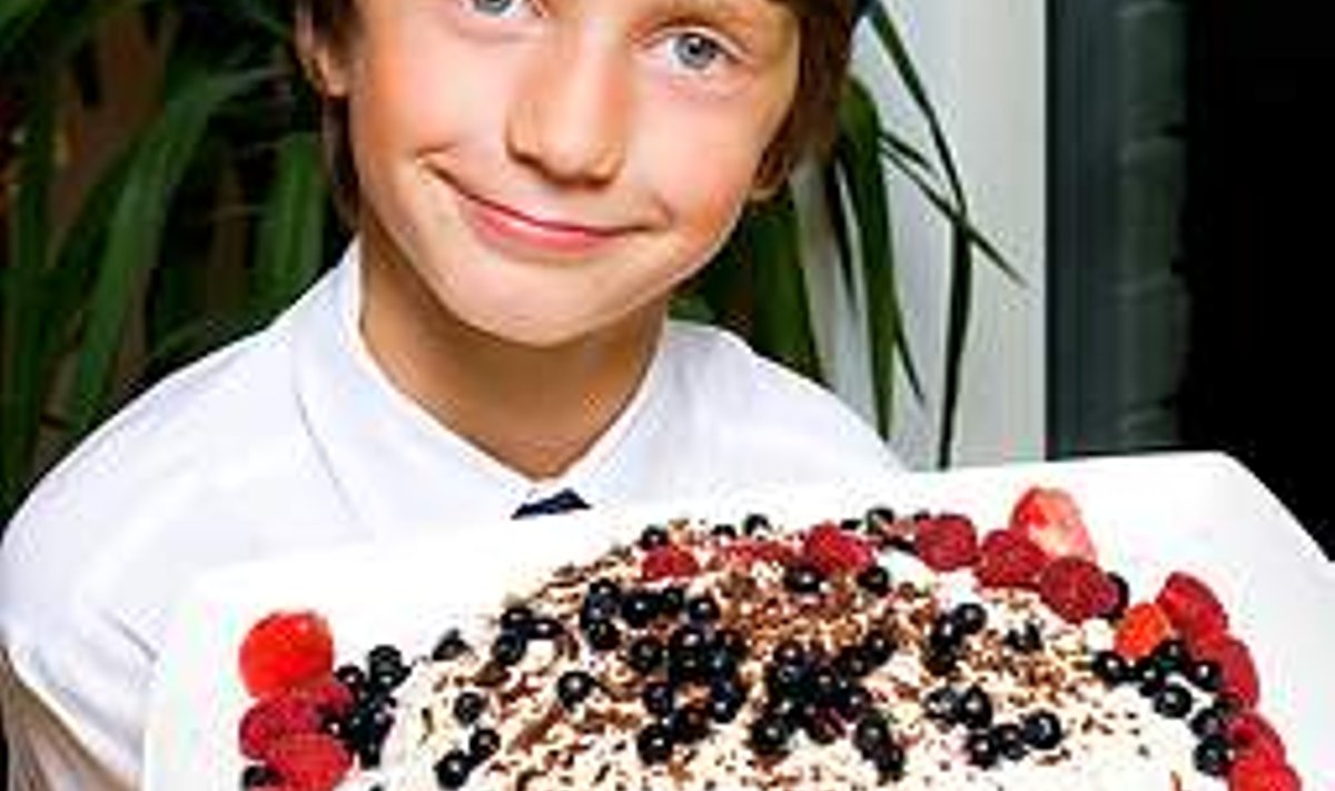 Koolipoisi kook: Karl Kristjan Martinson on läheneva tarkusepäeva ootuses elevil. ÜLLE VISKA