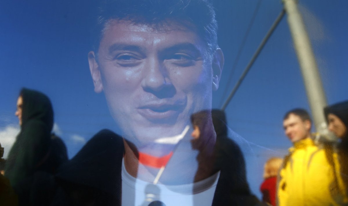 People commemorate Russian opposition politician Nemtsov on first anniversary of his murder in Moscow