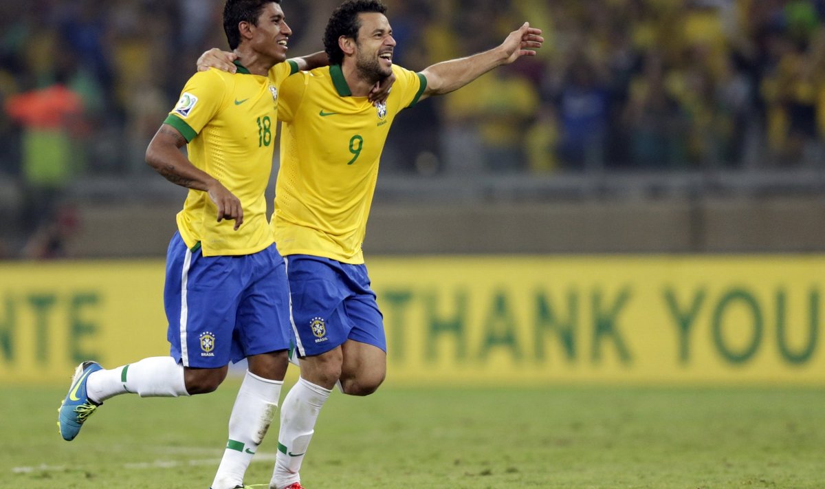 Brazil's Paulinho and Fred celebrate after their Confederations Cup semi-final soccer match against Uruguay at the Estadio Mineirao in Belo Horizonte