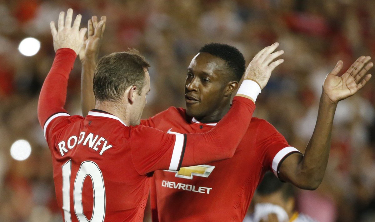 Manchester United forwards Rooney and Welbeck celebrate after Rooney scored their second goal against Los Angeles Galaxy during the first half of their international soccer friendly match in Pasadena