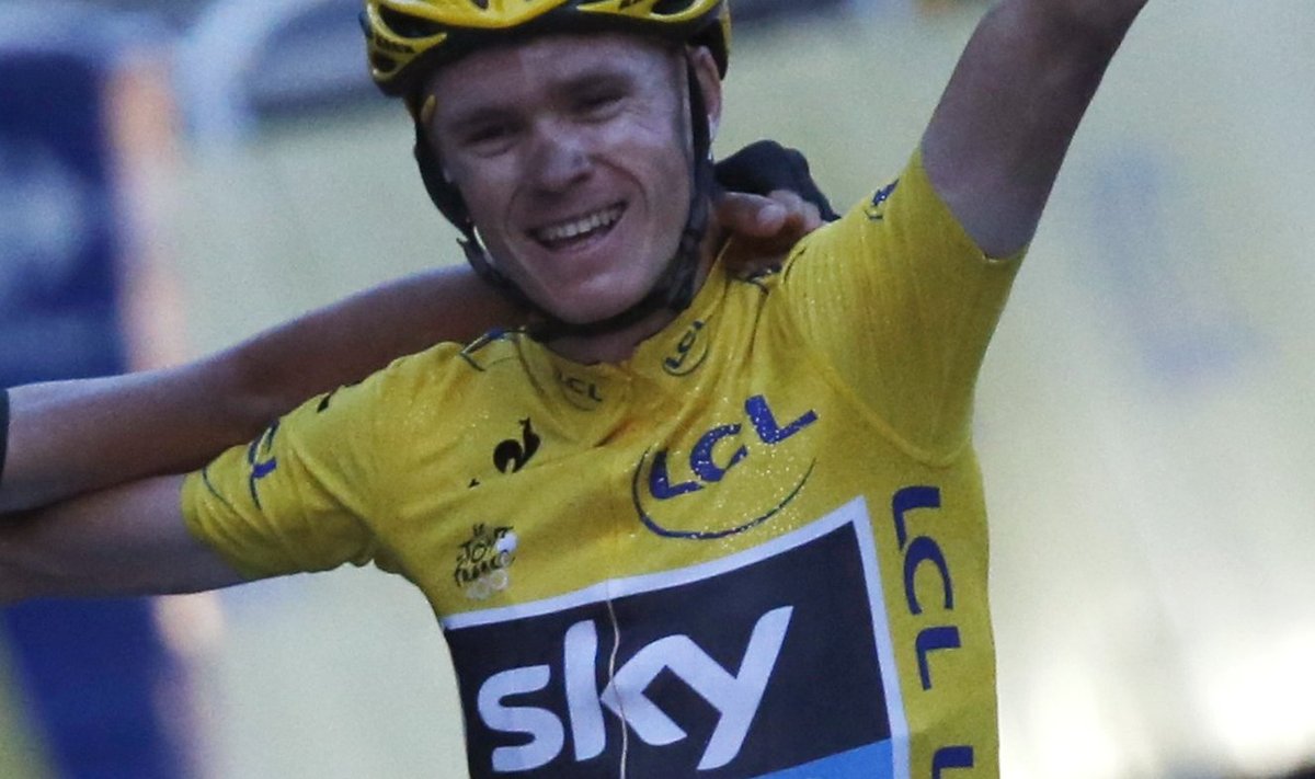 Team Sky rider and leader's yellow jersey holder Froome of Britain winner of the centenary Tour de France cycling race celebrates his overall victory after the 133.5km final stage from Versailles to Paris Champs Elysees
