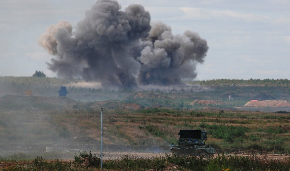 Smoke rises after a Russian TOS-1A Solntsepek multiple rocket launcher fired a missile during a demonstration at the annual international military-technical forum "ARMY" in Alabino