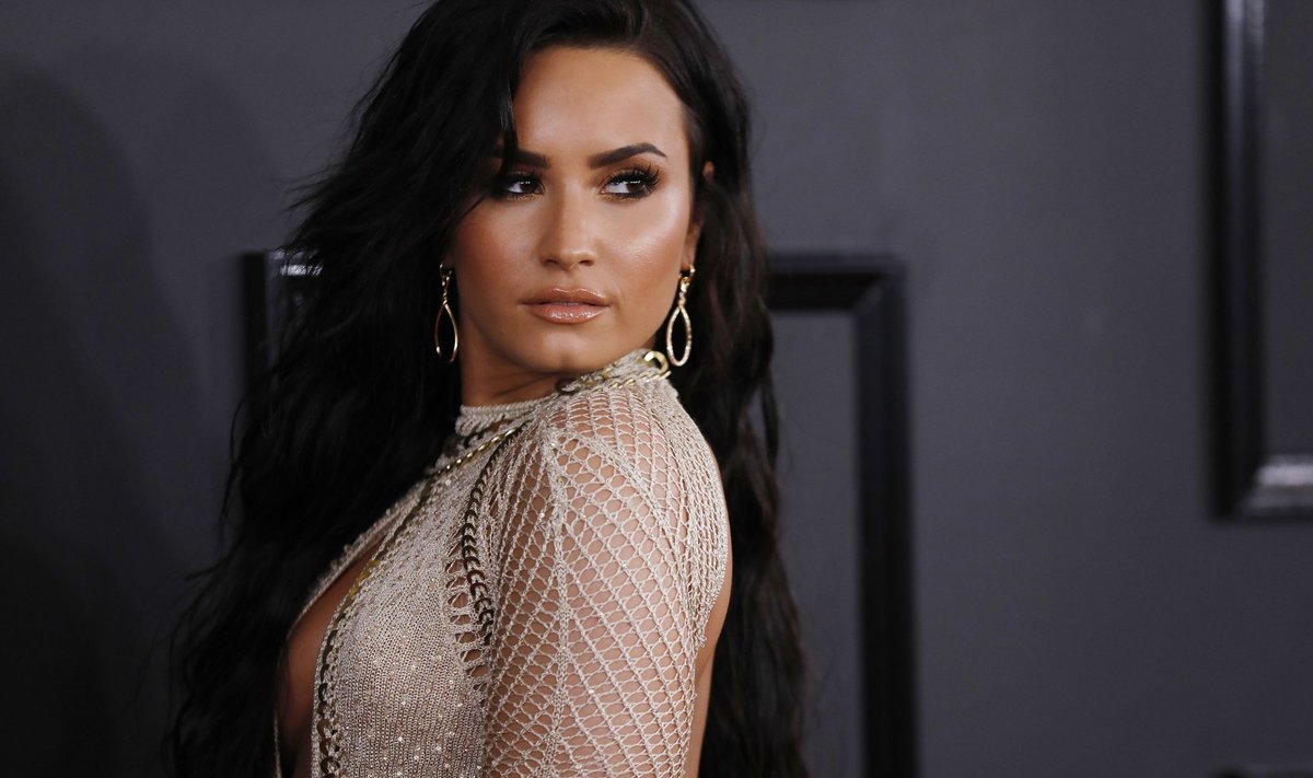 Singer Demi Lovato arrives at the 59th Annual Grammy Awards in Los Angeles