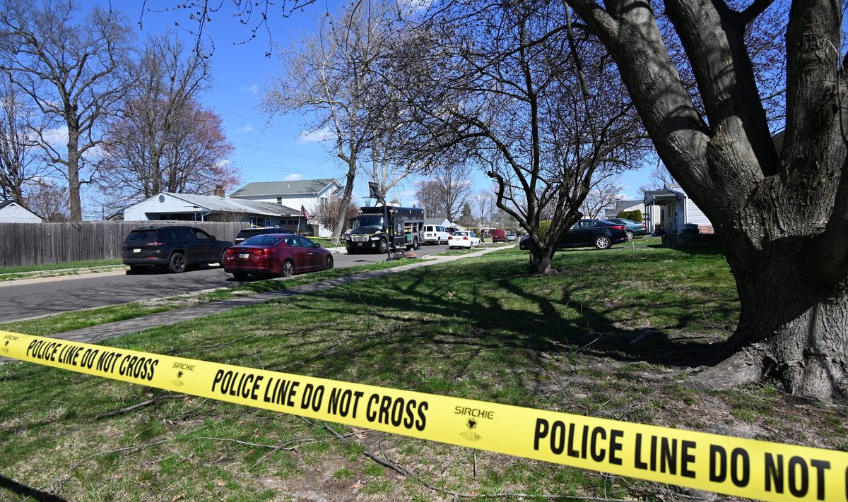 Investigators Work At Crime Scene Where Several People Were Killed In Levittown Pennsylvania