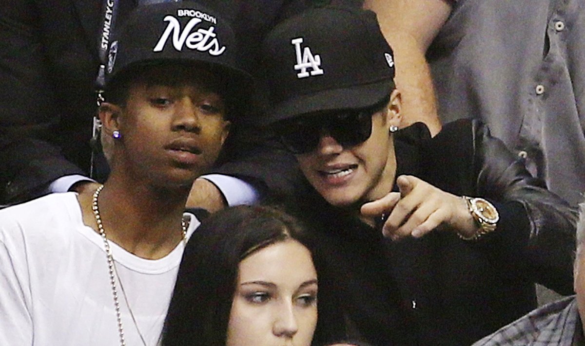 Singer Bieber sits in the crowd as he attends the Western Conference semi-final hockey playoff between the Los Angeles Kings and the San Jose Sharks in Los Angeles