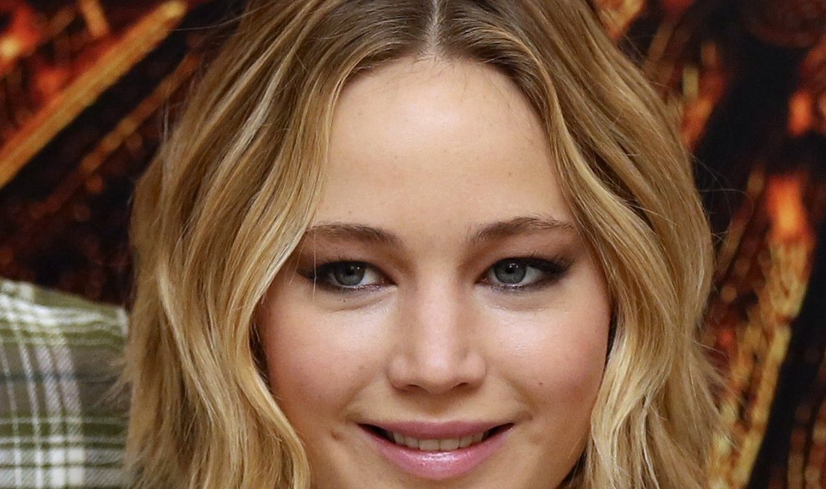 Actress Jennifer Lawrence attends the photocall for 'The Hunger Games: Mockingjay Part 1' in London