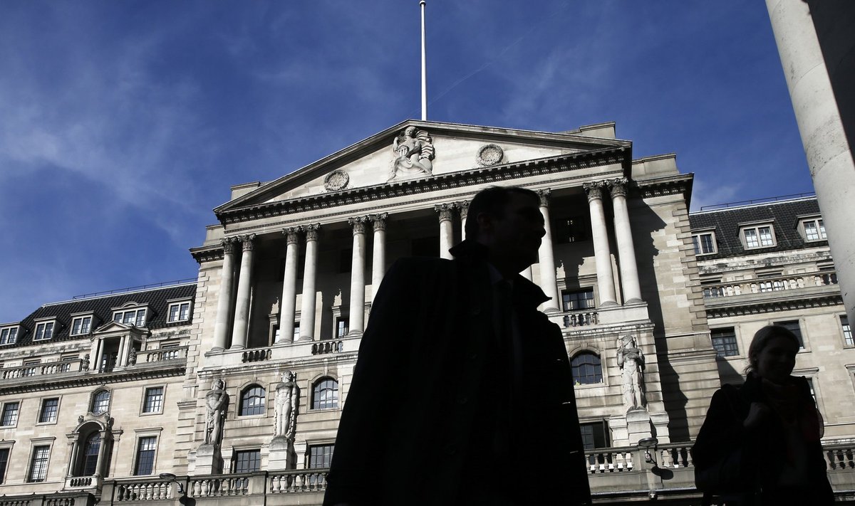 File photograph of pedestrians walking past the Bank of England in London