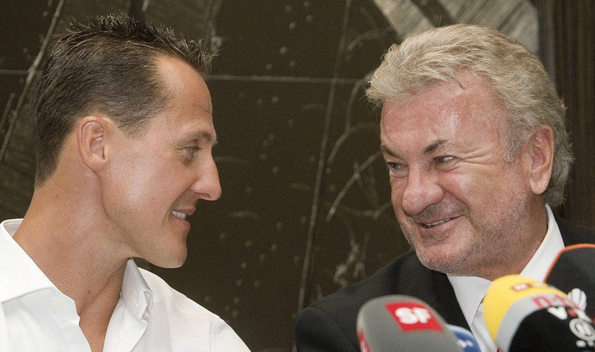 Michael Schumacher ja Willi Weber 2009. astal.